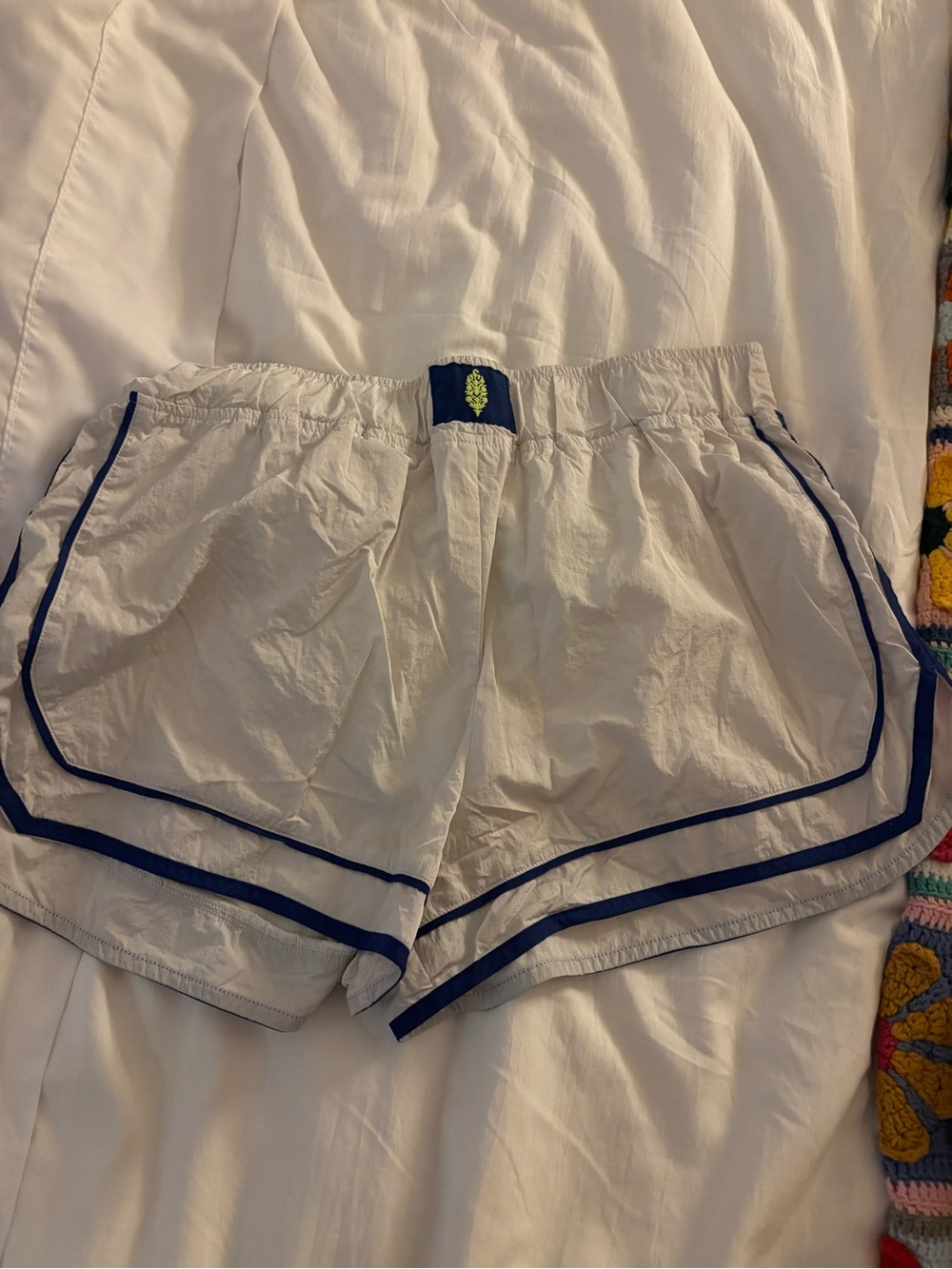 White Women’s Athletic Shorts with Navy Trim - Free People